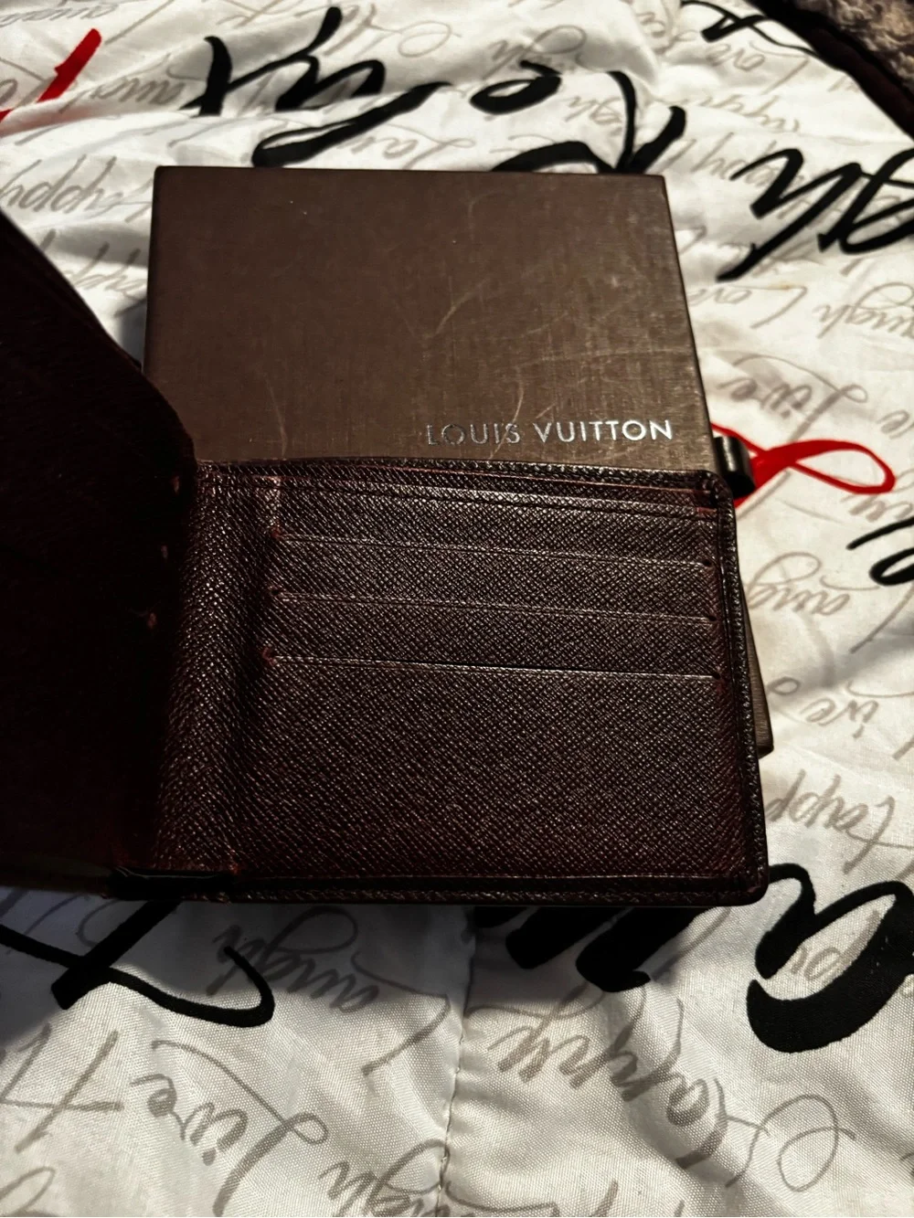 Louis Vuitton Dark Brown Textured Leather Bi-Fold Wallet